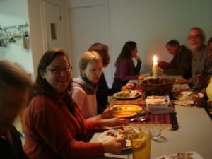 Thanksgiving Raw Style eating at the table